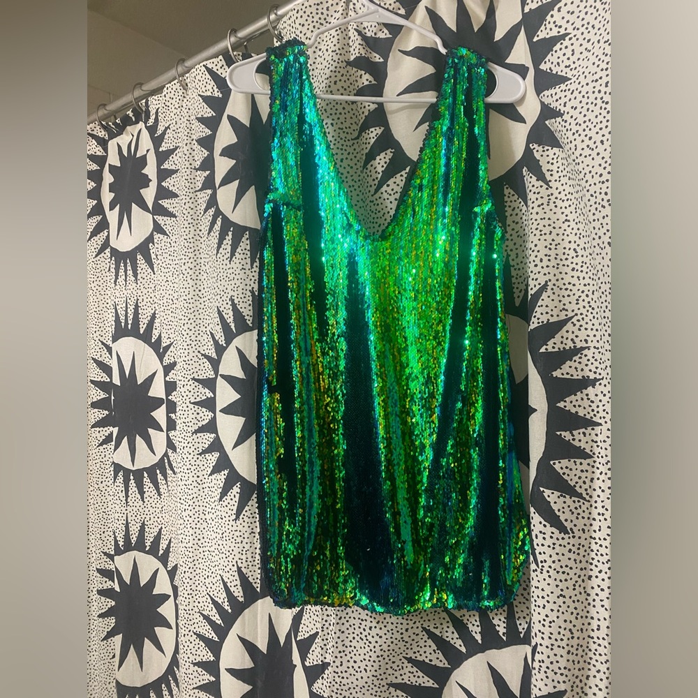 Free people tunic. Green and turquoise sequined.
